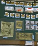 Wide-Angle Photo of Coins & Currency.