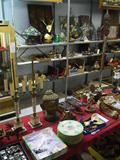 Wide-Angle Photo of Shelf & Table Items.