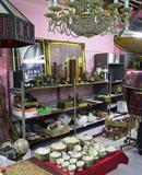Wide-Angle Photo of Shelf & Table Items.