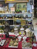 Wide-Angle Photo of Shelf & Table Items.