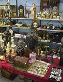Wide-Angle Photo of Shelf & Table Items.