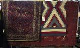 Wide-Angle Photo of Oriental Rugs & Navajo Rug or Blanket.