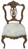 One of 6 Chairs from the 9 Pc. Ornate French-Carved Dining Room Suite.