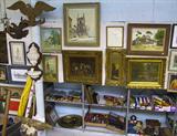 Wide-Angle Photo of Artwork & Shelf Items.