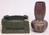 LOT OF 2 POTTERY VASES. IRIDESCENT BURGUNDY 11" VASE AND DARK GREEN ARTS & CRAFTS WINDOW BOX, MEASURING 5" TALL.