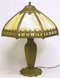 SLAG GLASS CURVED 6-PANEL LAMP. MEASURES 23" TALL. SHADE MEASURES 18" IN DIAMETER.
