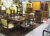 Overall View of 9 Pc. Ornate French-Carved Dining Room Suite.