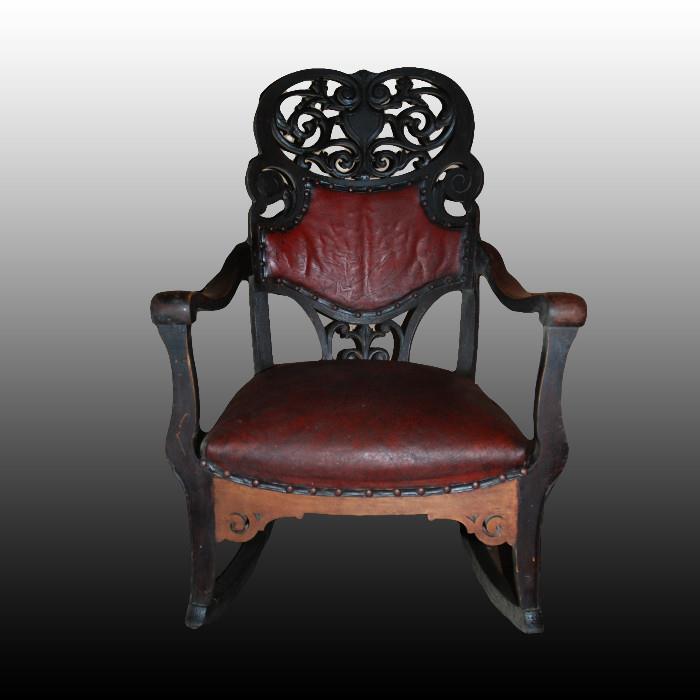 Carved open work mid late 19th century rocking chair with burgandy leather back and seat. Has original wear. lower middle support has been replaces at some point by a furniture craftsman
Condition: Very Good/Good
Shipping: please call to for estimated costs
Size: approx. 22" x 40" tall