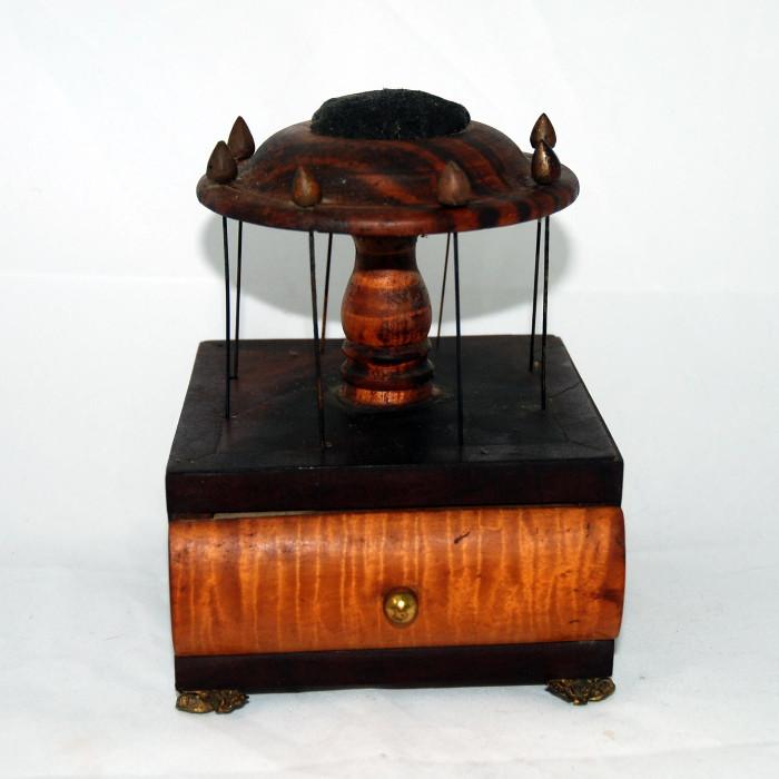 Mid nineteenth century burled wood sewing caddy with complete set of original thread pins and pin cushion. Beautiful burled drawer with bronze smashed feet
Condition: Very Good
Shipping: Yes
Size: 6" x 6"