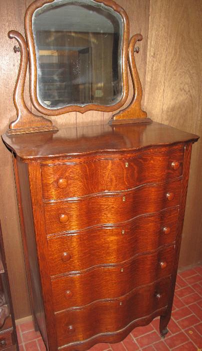 Best antique oak highboy ever. Original finish, serpentine drawers & beveled mirror. Circa 1890.