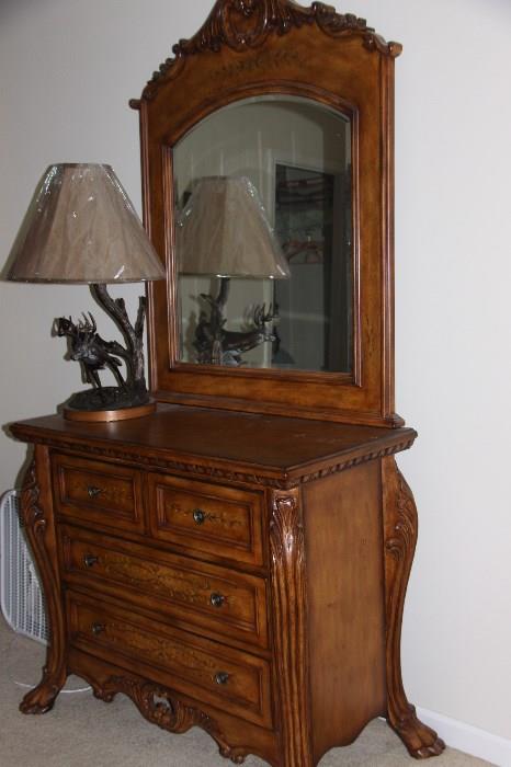Gorgeous like new carved small chest dresser with mirror. Cool modern statue lamp.