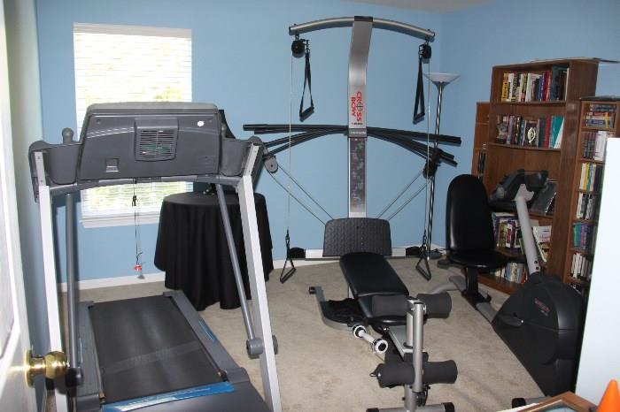 Top of the line awesome exercise equipment including treadmill with built in fan, Pro Form SR 30 seated elliptical machine, and Cross Bow system.