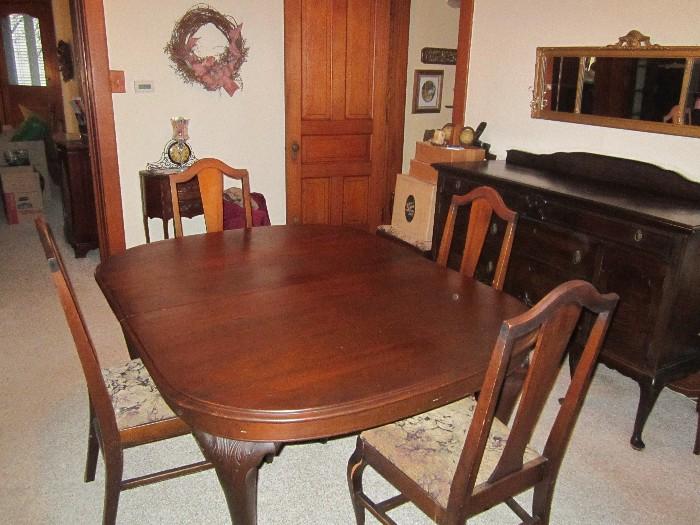 Dining table and chairs and buffet