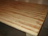 close-up of whitewashed pine table top