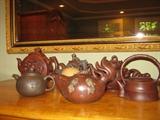 seven Zisha / Yixing teapots,  each one different & a work of art -- none have been used