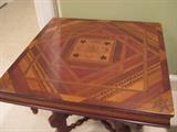marquetry top of antique table