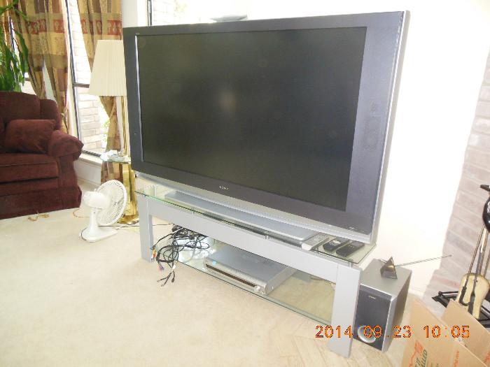 Sony HDTV ,s-Master, 60"  $200.00. The T.V. bench/stand  has tempered glass and metal is durable Priced at $150.00