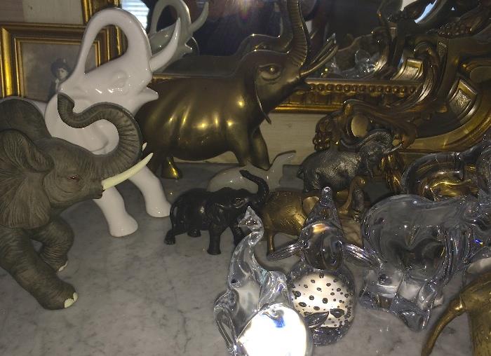 Collectibles including these elephants 
