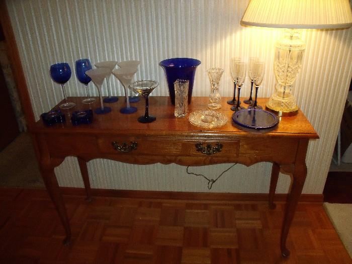 Bassett entry table with glassware on top