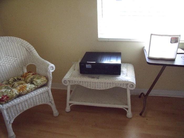 Small wicker side table with receiver on top