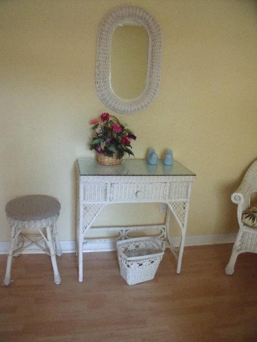 White wicker entry table or small desk with wicker mirror, stool and waste basket