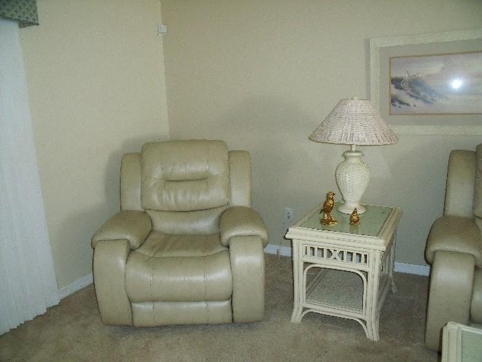 Matching rocker/recliner leather with rattan side table
