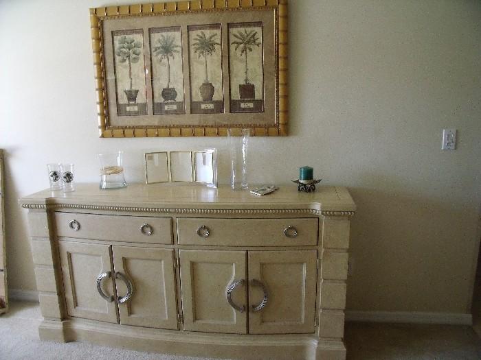 Credenza in dining room with palm print