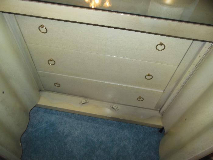 Doors open to 3 drawer chest