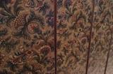 Detail of four panel folding screen of 19th C polychrome Lincrusta.