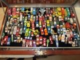 Many toy cars including a few redlines.