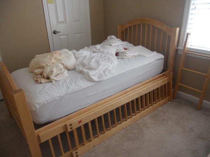 1 of 2 twin beds that are bunk beds also. Very nice looking