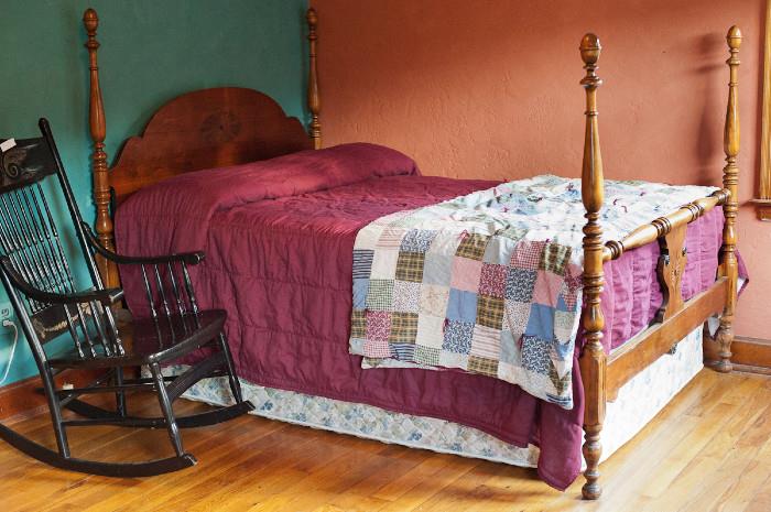 Antique rocking chair. Depression-era 4 post full-size bed.