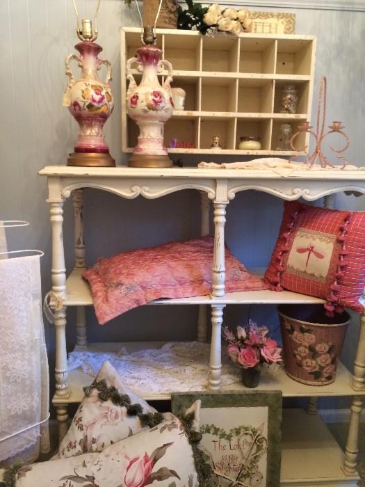 painted shelving unit, hand-painted lamps, vintage pillows
