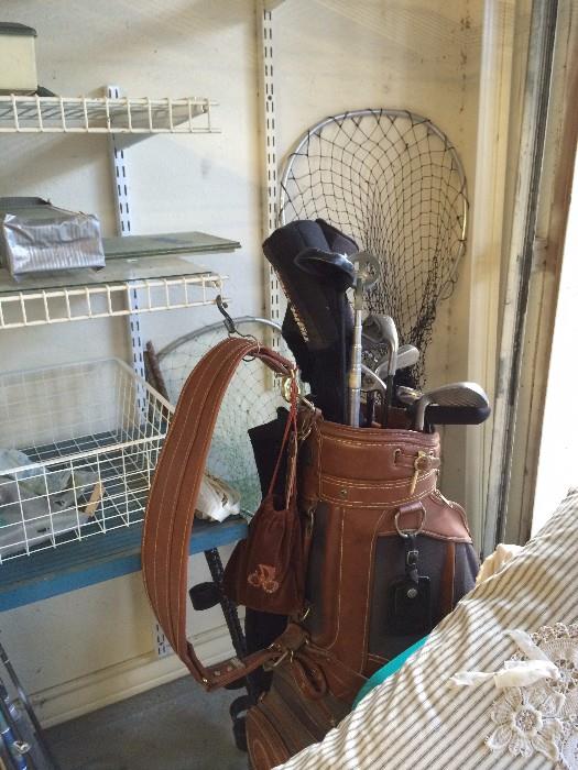vintage golf clubs and vintage golf bag, fishing net