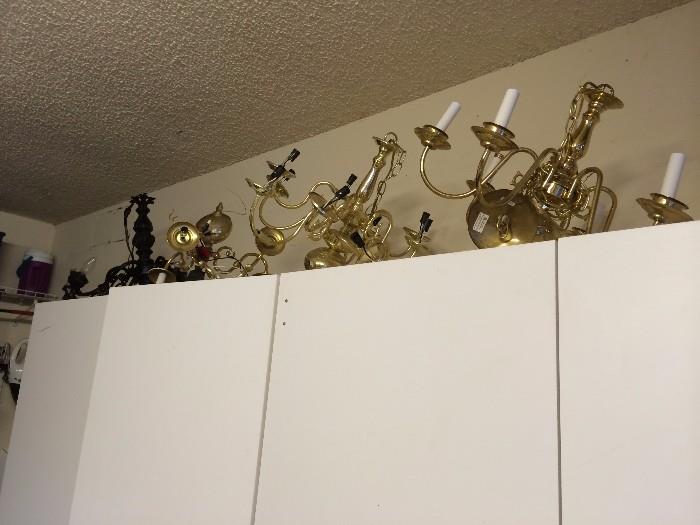 3 chandeliers and a pair of electric wall sconces