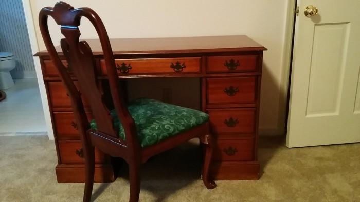 Nice mahogany chair, bad example of a mahogany desk. Maybe if it was painted, it would be included in the hipster coffee clatch.