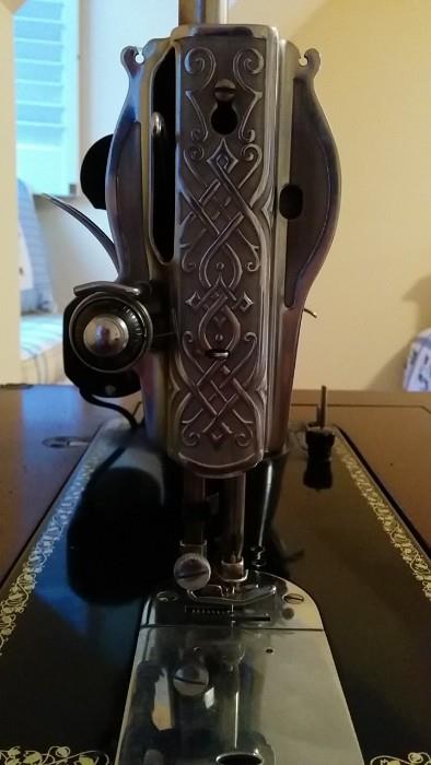 Love the machining on the head of this sewing machine.