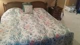 Queen size "Select Comfort" bed, with "French" cane headboard. The French just threw up a little in their mouths...