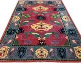 Lot#2257, TIBETAN WOOL RUG, 11' 6" X 8' 6"Red ground.