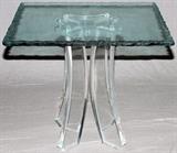 Lot#2322, GLASS & LUCITE TABLE, H 28", SQUARE TO, 32" X 32"having an etched edge in a ripple design. Pedestal base consisting four rectangular and curved legs.