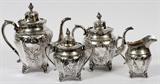 Lot#1005, GALE & HAYDEN COIN SILVER TEA & COFFEE SET, NEW YORK, 1847, FOUR PIECES.Including 1 teapot, H.10", 1 coffee pot, H.12", 1 creamer, and 1 covered sugar bowl; each piece is stamped "G & H" for William Gale & Nathaniel Hayden (c. 1846-50) along with lozenge enclosing 1847 date (see additional photo).  Totaling approximately 98.3 troy oz.