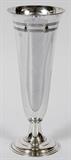 Lot#1010, TIFFANY & CO. STERLING VASE, C. 1910, H 12"Sterling silver trumpet-form vase with engraved banding, stamped under the base "Tiffany & Co. 17040 Makers 12078 Sterling Silver 925-1000 M [for John C. Moore II, 1907-1947]" (see additional photo).  Weighs approximately 23.7 troy oz.