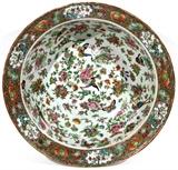 Lot#1074, CHINESE EXPORT BIRD & BUTTERFLY PORCELAIN BASIN, 19TH C., H 5", DIA 16"Round with flared rim, decorated in butterfly, bird, and floral motif. No apparent markings.