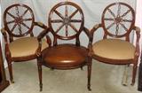 Lot#1177,WHEEL-BACK MAHOGANY & LEATHER ARMCHAIRS, THREE.Each has a pierced Wheelock back above an upholstered seat flanked by padded open arms.