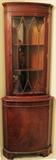 Lot#1178, MAHOGANY CORNER CABINET, MID 20TH C., H 74", W 26"Paneled glass front, lower cupboard.  Circa 1940s.