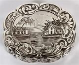 Lot#1265, VICTORIAN STERLING VINAIGRETTE BY EDWARD SMITH, BIRMINGHAM, 1845-46, L 1 5/8"Ovoid form box with gilt interior. Incise decorated with scene of home on the water. Hallmarked with lion passant, anchor, Queen Victoria in profile, date letter "W", maker's mark, "ES" enclosed. Measuring L. 1 5/8" x 1", with a total approximate weight of 0.685 tr.oz.