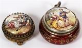 Lot#1268, CONTINENTAL ENAMEL PENDANT VINAIGRETTE & A MINIATURE, C. 1900, DIA 1"Including 1 round form enameled silver gilt vinaigrette, decorated at the hinged cover with a scene of two figures, one playing an instrument., Dia.1 1/8", hallmarks within, possibly Viennese (see additional photo); and 1smaller piece having three ball feet and enamel decorated genre scene on top, not marked.  Two items total.