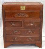 Lot#1329, CHINESE CAMPHOR WOOD CHEST, C. 1900, H 42", W 64", D 30"Two long drawers, 2 narrow drawers, and a blanket  chest on top. All having carved sea and landscapes on their facades. Larger carved seascape on the top. Brass latch at the top, all resting on bracket feet. Ping