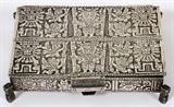 Lot#1345, PERUVIAN STERLING SILVER BOX, H 1 1/4", L 5 1/2", D 3 5/8"Hallmarked at the underside, relief decorated with figure and sun forms. Measuring H. 1 1/4" x 5 1/2" x 3 5/8", with a total approximate weight of 9.35 tr.oz.