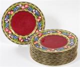Lot#1404, WEDGWOOD PORCELAIN DINNER PLATES, SET OF TWELVE, DIA 10 3/4"Pattern #W1044, each decorated in a fruit motif about the rim with a gold edge and maroon colored center. Stamped at the undersides {see additional photograph}, measuring Dia. 10 3/4".